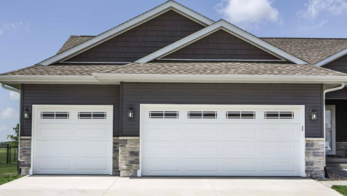 Professional technician performing garage door repair showcasing the before-and-after transformation in Gahanna, Ohio