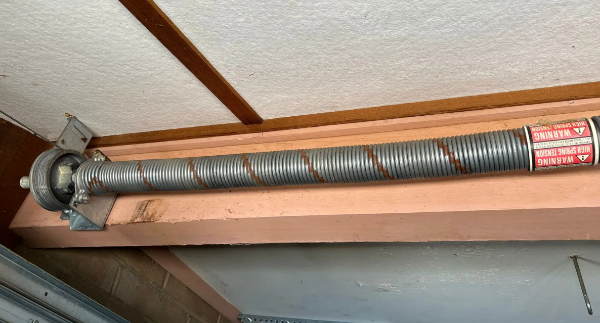 Garage door spring repair service in Gahanna, Ohio - fixing broken springs for residential and commercial garage doors to ensure safety and functionality.